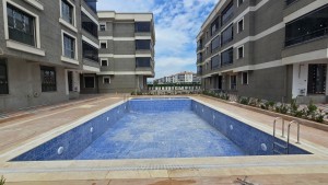 MG GÜNEŞ EMLAK'TAN SATILIK LÜX HAVUZLU DAİRE
